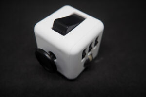 Ways the Fidget cubes is a sensory toy that help kids with Autism manage behaviors and mood in a healthy way.